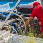 Worker fixing a residential pool