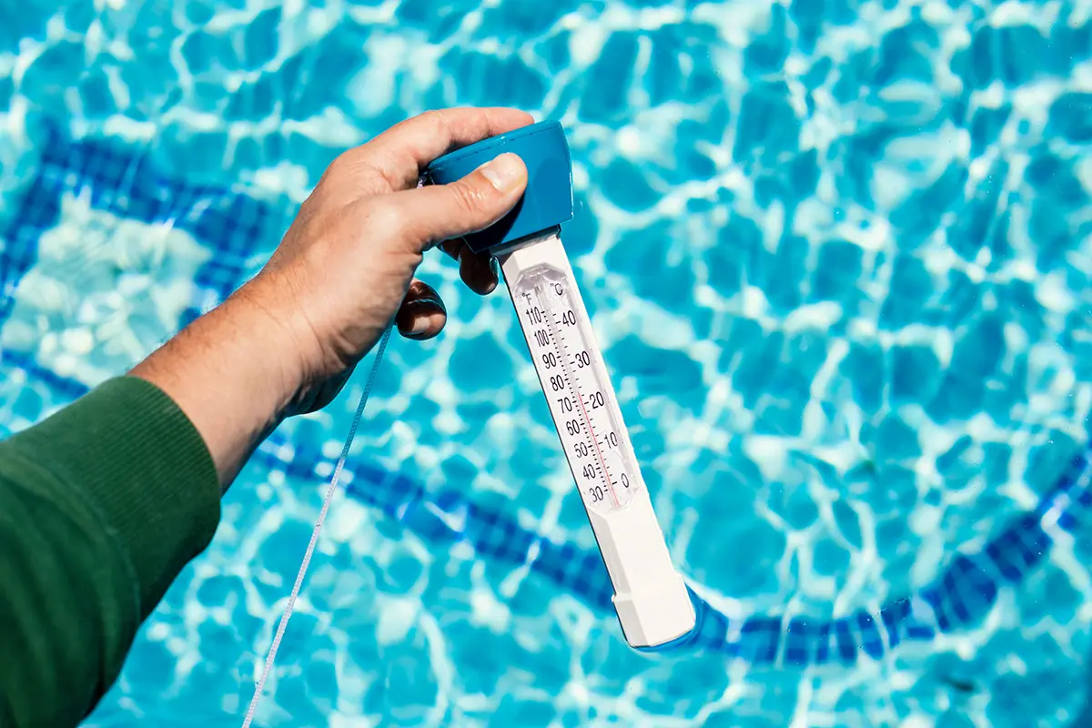 Pool thermometer to measure the temperature of the pool water in spring summer.